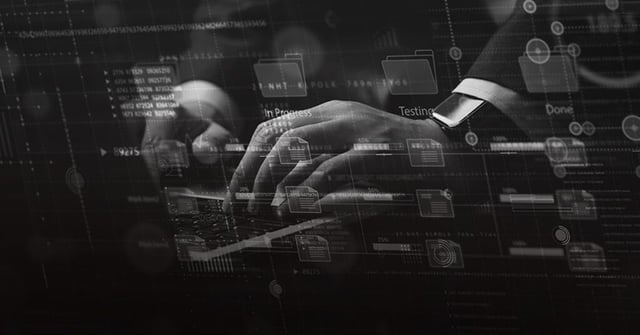 man typing on laptop keyboard and files double exposure